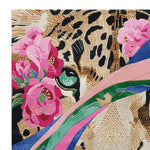 Close-up view of the Petals Meet Predator Hand Tufted Rug showcasing an abstract design with vibrant pink floral accents and a striking tiger motif. Ideal as a square area rug, this wool rug adds a bold statement to large living room spaces, combining elegance and uniqueness in rugs for living room decor.