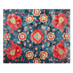 The Petals of Flame Hand Tufted Area Rug features a striking floral design with vibrant red and orange flowers set against a deep blue background. Perfect for adding a touch of elegance to dining rooms or as a centerpiece in living room rugs 8x10, this wool rug combines durability with style. Ideal for those seeking a unique floral rug or dining room carpets.