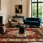 Elegant living room featuring the Petals of Heritage Hand Knotted Area Rug. This stunning 8x10 floral rug showcases intricate vintage Persian designs with vibrant red and cream tones, enhancing the classic decor. Ideal for those seeking luxurious living room area rugs.