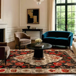 Elegant living room featuring the Petals of Heritage Hand Knotted Area Rug. This stunning 8x10 floral rug showcases intricate vintage Persian designs with vibrant red and cream tones, enhancing the classic decor. Ideal for those seeking luxurious living room area rugs.