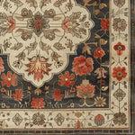 Close-up of the Petals of Heritage Hand Knotted Area Rug, showcasing an intricate floral pattern with vintage Persian rug design elements. Ideal for those seeking an elegant living room area rug in an 8x10 size, this exquisite piece blends traditional charm with the beauty of floral motifs.