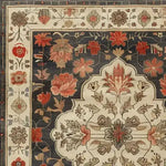 Close-up of the Petals of Heritage Hand Knotted Area Rug, showcasing intricate floral patterns in vibrant reds and oranges on a rich navy background. Perfect for elevating living room decor, this vintage-inspired Persian rug adds elegance and charm to any space. Ideal for those seeking an exquisite 8x10 living room area rug.