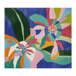 A vibrant Petalscape Layers Hand Tufted Area Rug featuring an abstract floral design in bold colors like blue, green, pink, and orange. This contemporary wool rug is perfect for adding a splash of color to living room area rugs, making it an ideal choice for area rugs for living room decor.