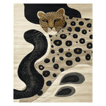 The Phantom Jungle Grace Hand Tufted Rug is a striking area rug featuring an abstract depiction of a leopard with bold black and tan spots, against a textured beige background. This contemporary wool rug is perfect for large living rooms, adding a touch of elegance and exotic flair to any space. It's an ideal choice for those seeking unique area rugs for living room decor.