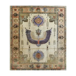 The Pharaoh's Feathers Hand Knotted Area Rug features a stunning Egyptian-inspired design with intricate patterns and vibrant colors. This vintage rug, perfect for living room rugs 8x10, showcases a central motif of an ancient symbol with elegantly spread wings, surrounded by ornate borders reminiscent of Persian rugs.