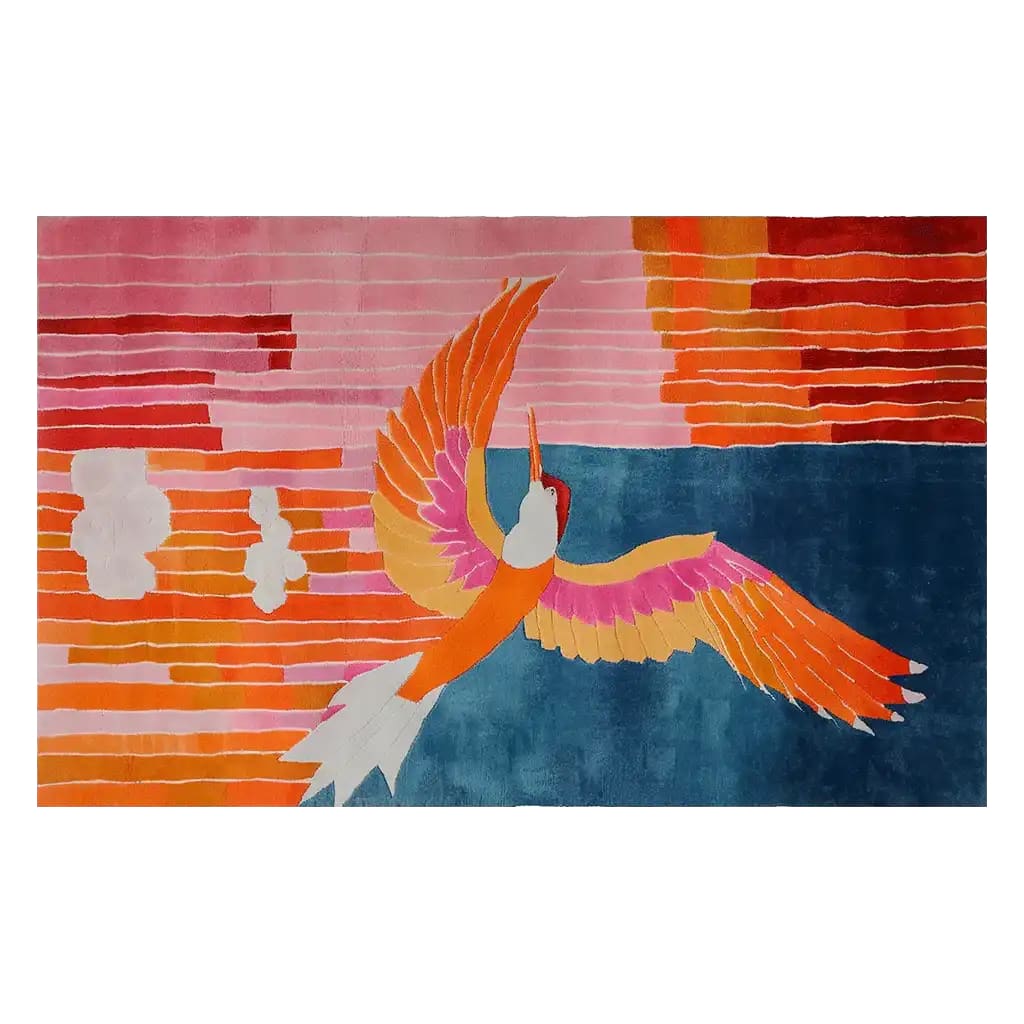 Vibrant area rug featuring a colorful phoenix design, hand tufted from wool. Ideal for adding a pop of color to your living room, this wool rug showcases a dynamic blend of orange, pink, and blue tones with abstract patterns.