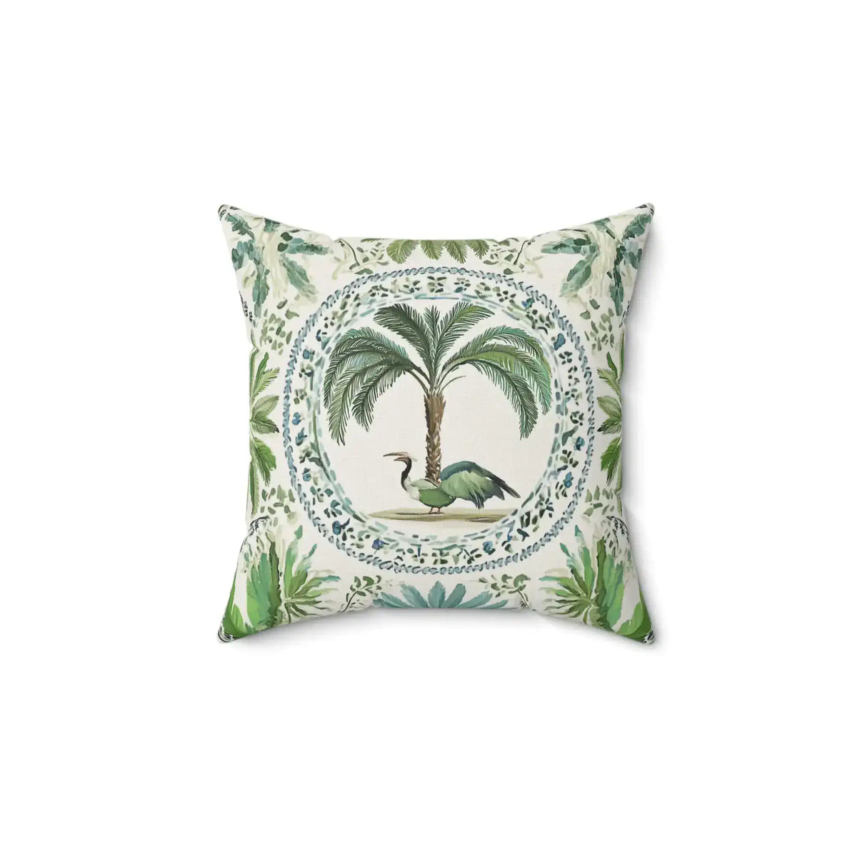 Decorative pillow with palm tree and bird design on a white background