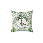 Decorative pillow with palm tree and bird design on a white background