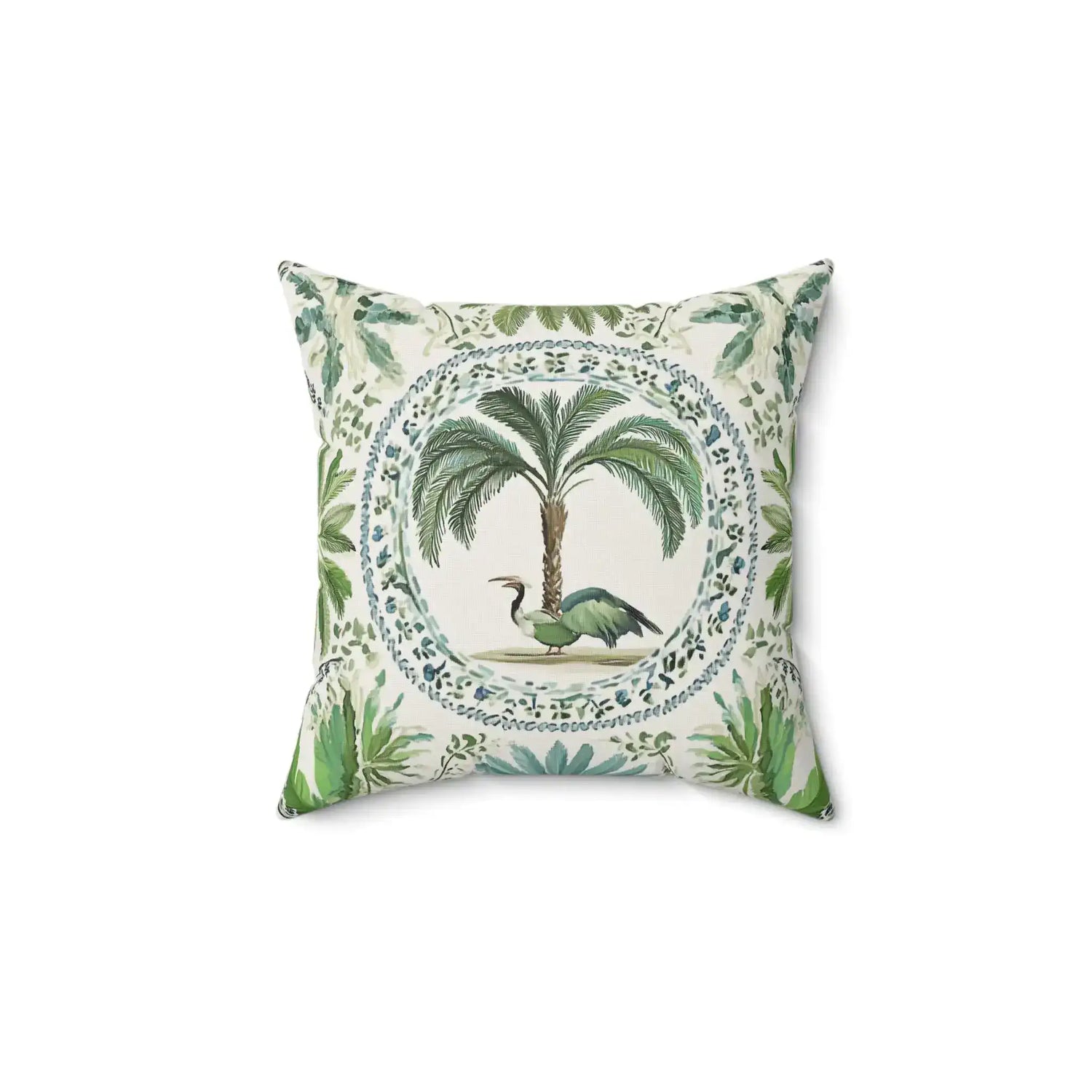 Decorative pillow with palm tree and bird design on a white background