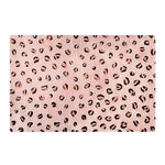 Stylish pink and black leopard print hand tufted wool area rug, perfect for adding a touch of flair to your living room or as a chic kitchen runner. This large area rug features a bold animal pattern, ideal for vintage and modern decor alike.