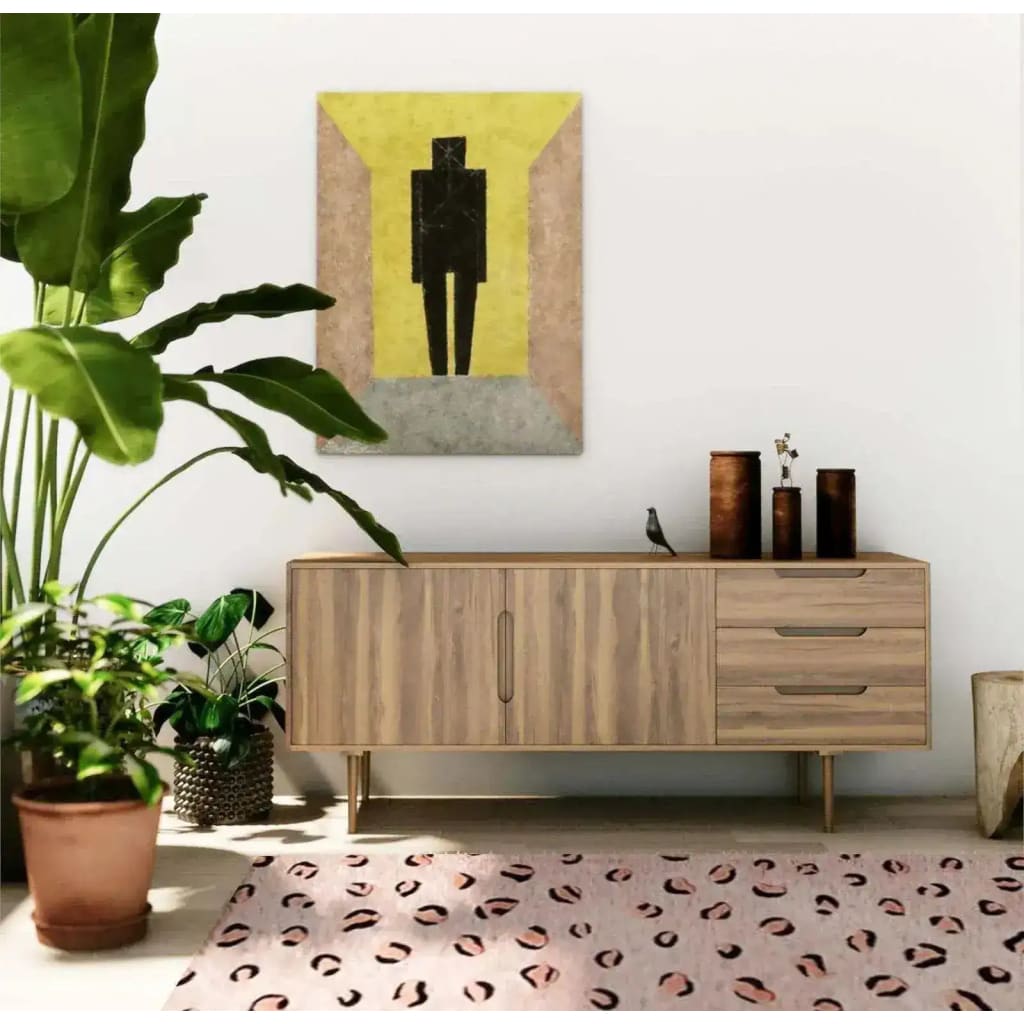 Stylish living room featuring a pink and black leopard print area rug made of hand-tufted wool. The rug adds a chic touch to the space with its abstract design, ideal for large living rooms or as a hallway runner rug. Complemented by a wooden sideboard and modern decor, this setting highlights the versatility of wool rugs in contemporary home design.