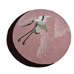 This is a beautifully crafted hand-tufted round area rug featuring elegant Japanese cranes in flight on a soft pink background. Perfect for adding a touch of sophistication to your bedroom or living room, this wool rug combines artful design with comfort. Ideal as a large area rug for bedrooms or living rooms.