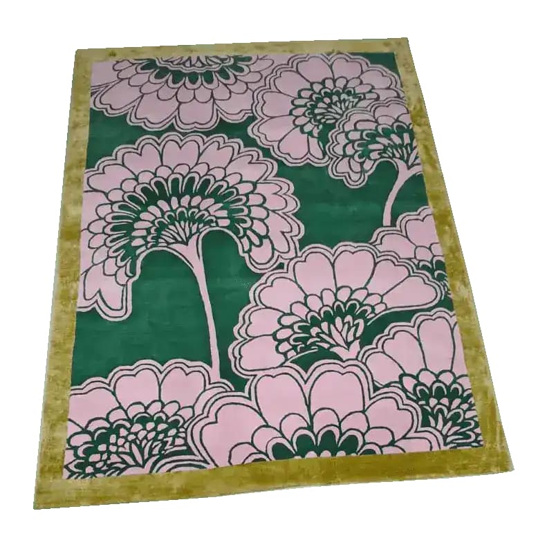 A beautifully crafted Pink Gingko Leaves Hand Tufted Wool Rug, ideal for large living rooms. This vibrant area rug features intricate pink floral patterns on a deep green background, perfect as a centerpiece for your living room. Sized 8x10, this wool rug adds warmth and style to any space.