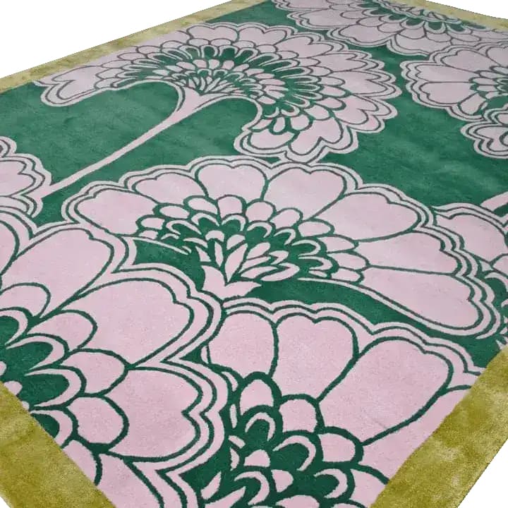 The Pink Gingko Leaves Hand Tufted Wool Rug features a stunning botanical design with pink and green patterns, perfect for enhancing any large living room. This luxurious area rug, ideal for living room spaces, measures 8x10 and offers a cozy, stylish addition to your decor.