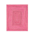 Top view of a vibrant pink hand-braided jute rug, perfectly suited for large living rooms. This 8x10 area rug features a beautiful geometric pattern, making it an ideal choice for adding a splash of color to any living space.