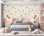 Pink kids bedroom with globe pendants against pastel watercolor blossom wallpaper on cream