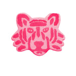 Vibrant pink lion face hand-tufted area rug, perfect for adding a bold touch to your office decor. This round wool rug offers a playful and artistic design, ideal for those seeking unique office rugs or large area rugs to enhance their workspace.