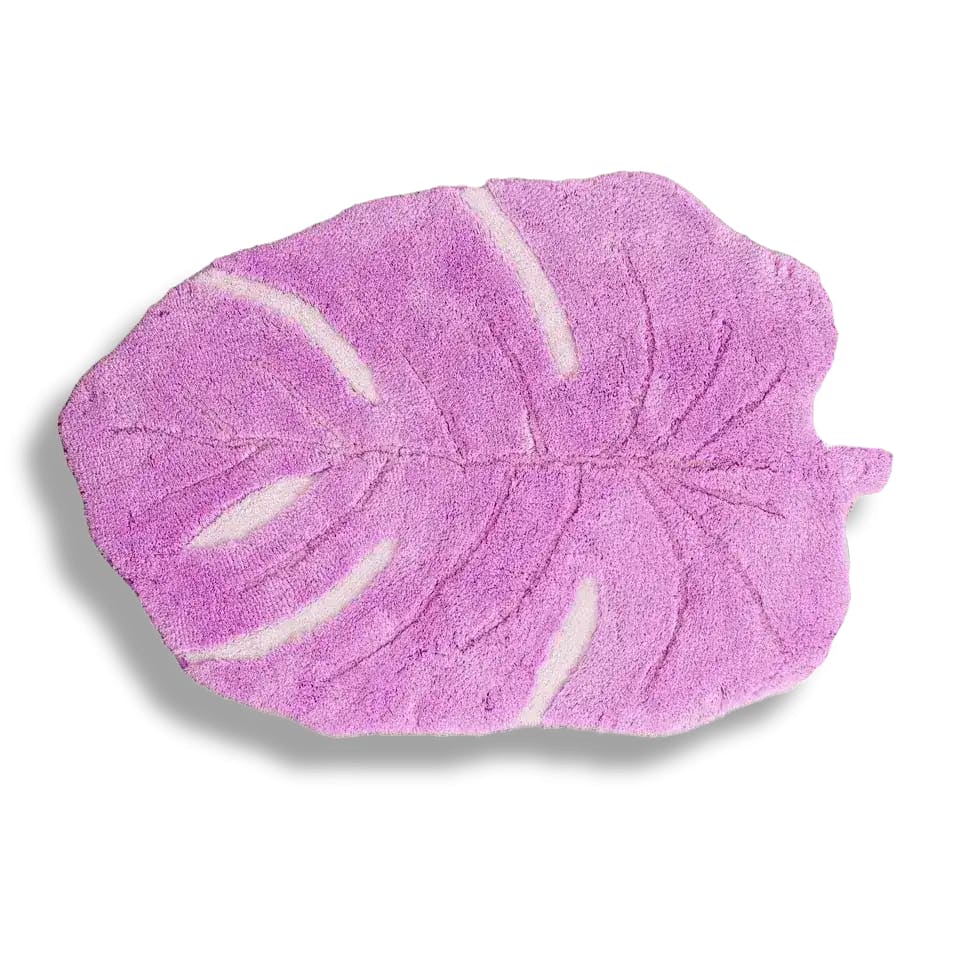 A beautifully crafted area rug in the shape of a pink monstera leaf, made from hand-tufted wool. This vibrant wool rug adds a touch of nature-inspired elegance to any space, perfect for living rooms. Ideal as a centerpiece in living room rugs 8x10 collections.
