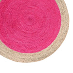 Vibrant pink round jute rug with a natural border, perfect as an area rug for living rooms. This boho rug adds a pop of color and texture to any space, making it ideal for a cozy and stylish living room setup.
