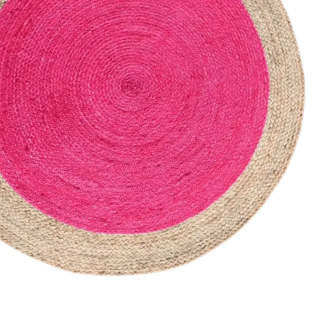 Vibrant pink round jute rug with a natural border, perfect as an area rug for living rooms. This boho rug adds a pop of color and texture to any space, making it ideal for a cozy and stylish living room setup.
