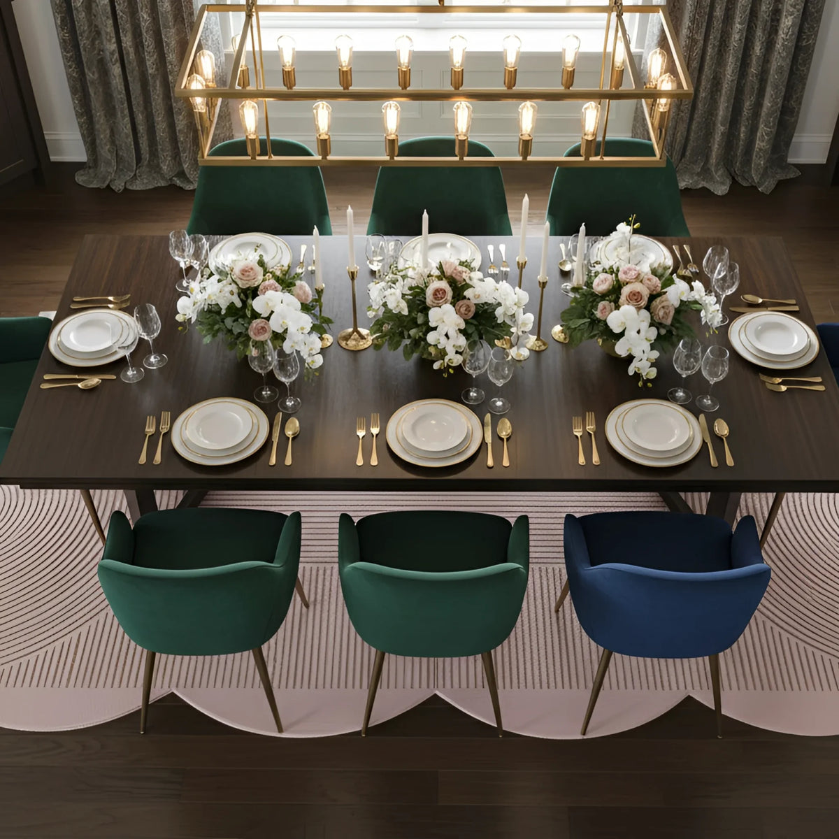 Dining table set with plates, silverware, and floral centerpieces in a stylish room.