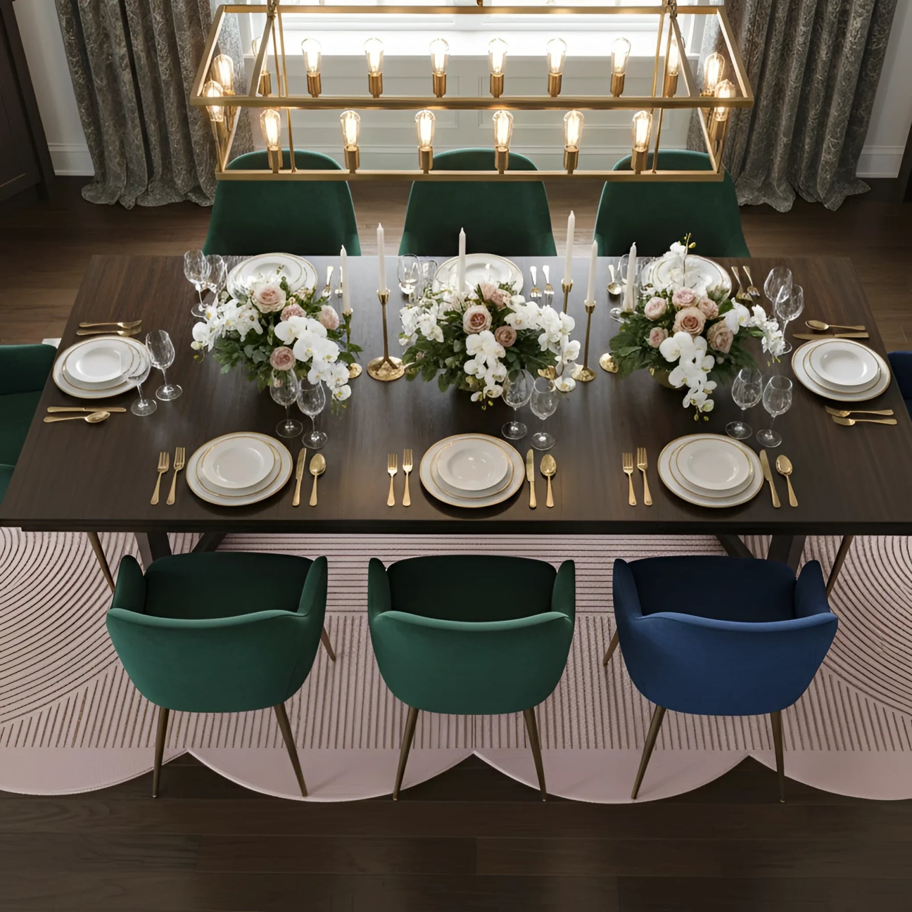 Dining table set with plates, silverware, and floral centerpieces in a stylish room.