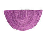 Vibrant pink semi-circle area rug made from durable jute, perfect for adding a pop of color to your dining room or large living room. This round rug design is ideal for those looking to enhance their living space with stylish dining room carpets and living room accents.