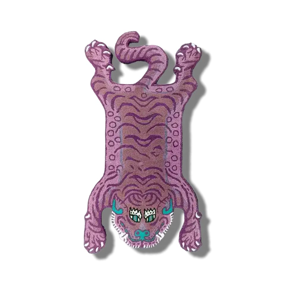 The Pink Tibetan Tiger Accent Wool Rug features a unique and vibrant tiger design, ideal for enhancing your living room decor with its vintage appeal. This large area rug, crafted from high-quality wool, adds a stylish and exotic touch to any space, perfect for those looking to elevate their home with distinctive living room area rugs.