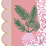 Close-up view of the Pink White Giraffe Tropic Scallop Hand Tufted Area Rug, showcasing vibrant green tropical leaves against a pink background with intricate patterns. Perfect for adding a lively touch to dining room carpets or as a wool rug in the living room, enhancing formal dining room aesthetics.