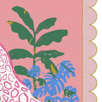 Detailed view of the Pink White Giraffe Tropic Scallop Hand Tufted Area Rug, showcasing its vibrant design with green and blue tropical leaves on a pink background. Perfect for adding a splash of color to dining room carpets or wool rugs in the living room, enhancing formal dining room spaces.