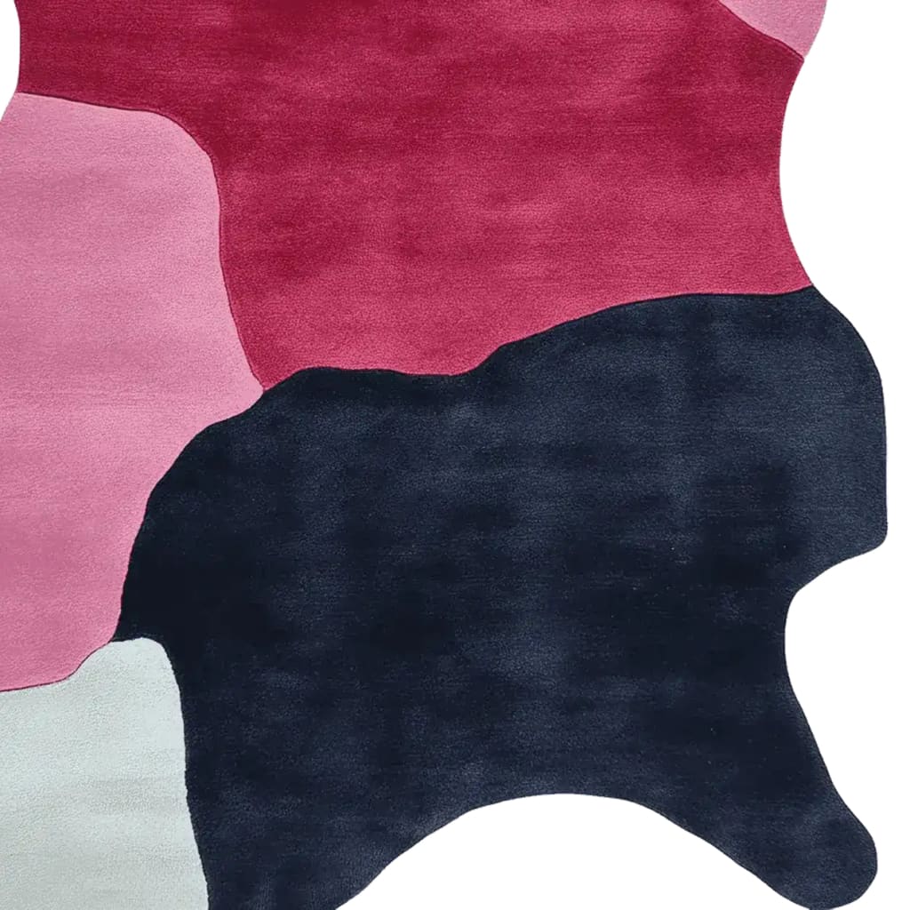 A vibrant, hand-tufted area rug showcasing a playful abstract design in bold shades of red, pink, and black. This contemporary wool rug adds a stylish touch to living room spaces, perfectly sized for 8x10 areas.