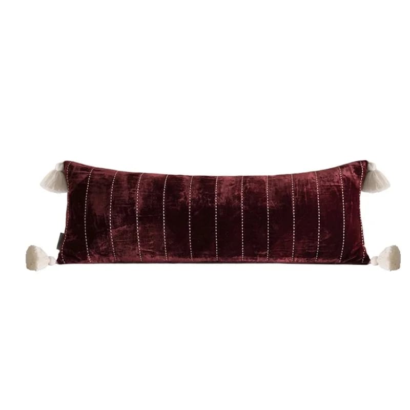 Luxurious plush velvet throw pillow cover with tassels, perfect for adding elegance to any living space.