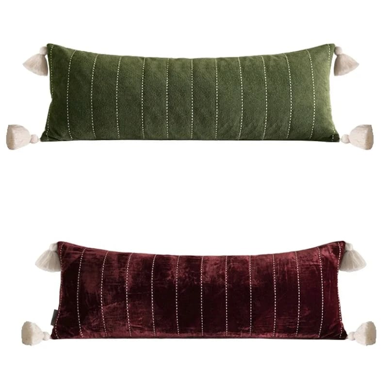 Stylish throw pillow cover in plush velvet with tassels, featuring green and burgundy colors and striped design.