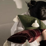 Stylish plush velvet throw pillows with tassels, perfect for home decor and comfort.