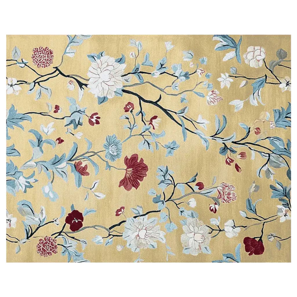 The Poetic Garden Grace Hand Tufted Area Rug showcases a vibrant floral design on a warm, gold background. This wool rug features intricate patterns of blooming flowers and delicate branches, making it an ideal choice for large living room spaces.