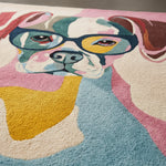 Colorful rug with a dog design wearing glasses on a plain background