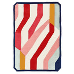 Vibrant Pop Stripe Shuffle Hand Tufted Area Rug featuring bold red, pink, and orange stripes with a contemporary design, perfect for adding a touch of modern flair to any living room. This wool rug offers a unique and stylish edge, ideal for those seeking distinctive living room area rugs.