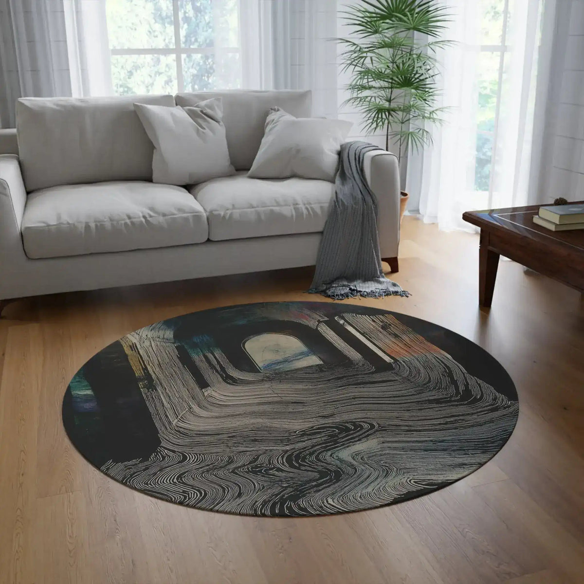 Portal Drip Round Rug styled in living room on hardwood floor dark corridor archway drip design in grey sofa setting