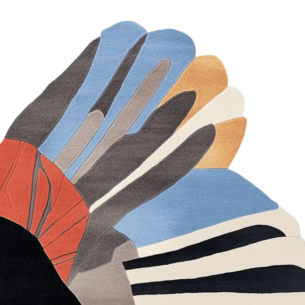 A vibrant, abstract Power Wing Pop Hand Tufted Area Rug featuring a colorful design with shades of blue, orange, and black, ideal for a contemporary living room setting. This wool rug offers a unique and artistic touch, perfect for 8x10 spaces.