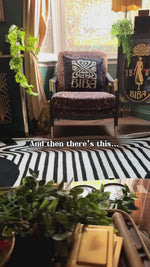art deco rug styling in a maximalist living rooom