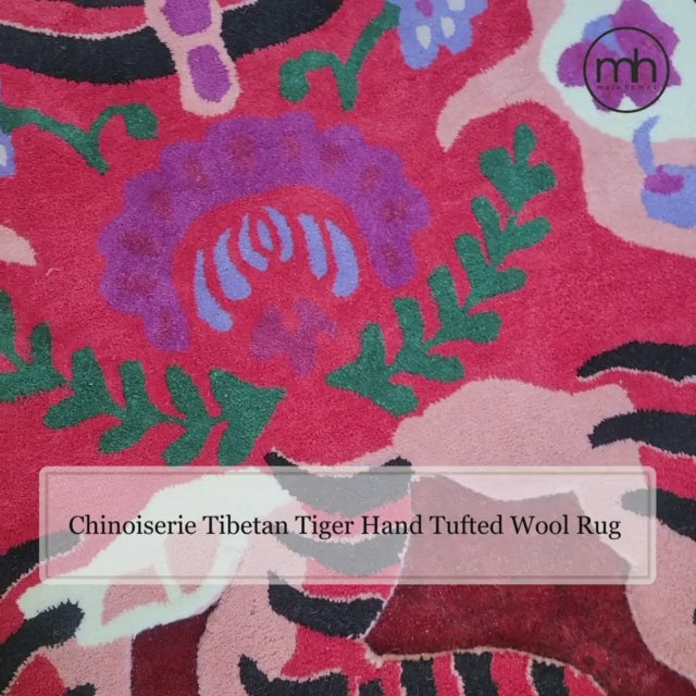 The Chinoiserie Pink Tibetan Tiger Tufted Wool Rug is a visually stunning and luxurious addition to your home decor. This rug features a Chinoiserie-inspired design, blending traditional Asian aesthetics with a contemporary touch. The vibrant pink color adds a pop of warmth and style to any space.