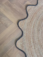 round jute rug in a living room