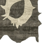 Top view of the Primitive Core Echo Hand Tufted Area Rug, showcasing an abstract design resembling a stylized animal hide. This contemporary wool rug in neutral tones is perfect for large living rooms, adding a modern touch to any space.