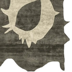 Top view of the Primitive Core Echo Hand Tufted Area Rug, showcasing an abstract design resembling a stylized animal hide. This contemporary wool rug in neutral tones is perfect for large living rooms, adding a modern touch to any space.