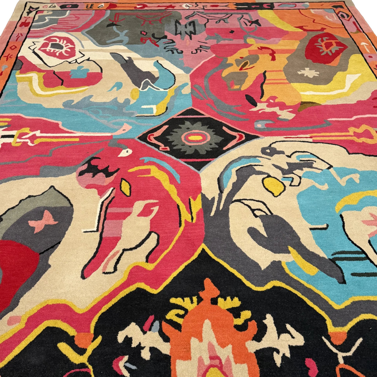 A vibrant, abstract Prismatic Core Hand Tufted Rug measuring 8 x 10 ft, perfect for large living room spaces. This wool rug features a colorful mix of pink, blue, yellow, and black tones, evoking a vintage feel ideal for living room area rugs.