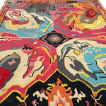 A vibrant, abstract Prismatic Core Hand Tufted Rug measuring 8 x 10 ft, perfect for large living room spaces. This wool rug features a colorful mix of pink, blue, yellow, and black tones, evoking a vintage feel ideal for living room area rugs.