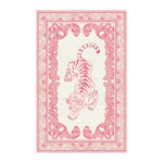 Prowess in Pink Garden Hand-Tufted Area Rug featuring an elegant tiger design in pink with intricate floral borders. This wool rug is perfect for enhancing the ambiance of a living room, offering a luxurious touch to large living room spaces.
