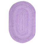 Top view of a purple elongated oval area rug made of jute, perfect for adding a boho touch to your living room or dining room. This versatile jute rug is ideal for creating a cozy atmosphere in both living room and dining room spaces.