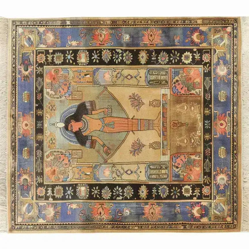The Pyramid Dreamscape Hand Knotted Area Rug showcases a vintage design with intricate Egyptian motifs, perfect for adding a touch of elegance to your living room. This large Persian-style rug features vibrant colors and detailed patterns, ideal for those seeking unique area rugs for their living space.