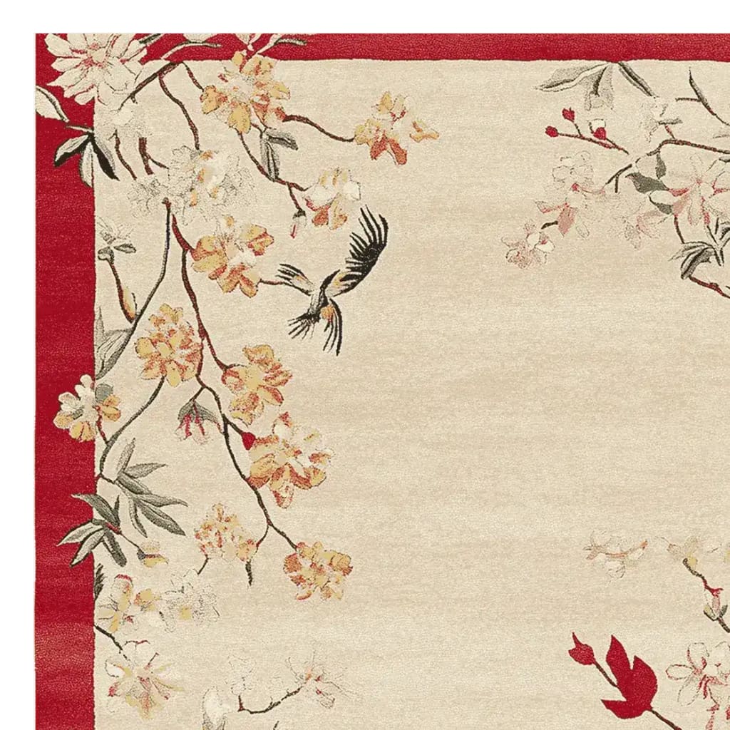 The Quiet Meadow Song Hand Tufted Rug features an elegant design with delicate floral patterns and a bird motif, perfect for enhancing your living room area. This wool rug combines warmth and style, making it an ideal choice for area rugs for living room decor.